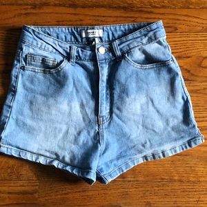 high waisted light washed shorts